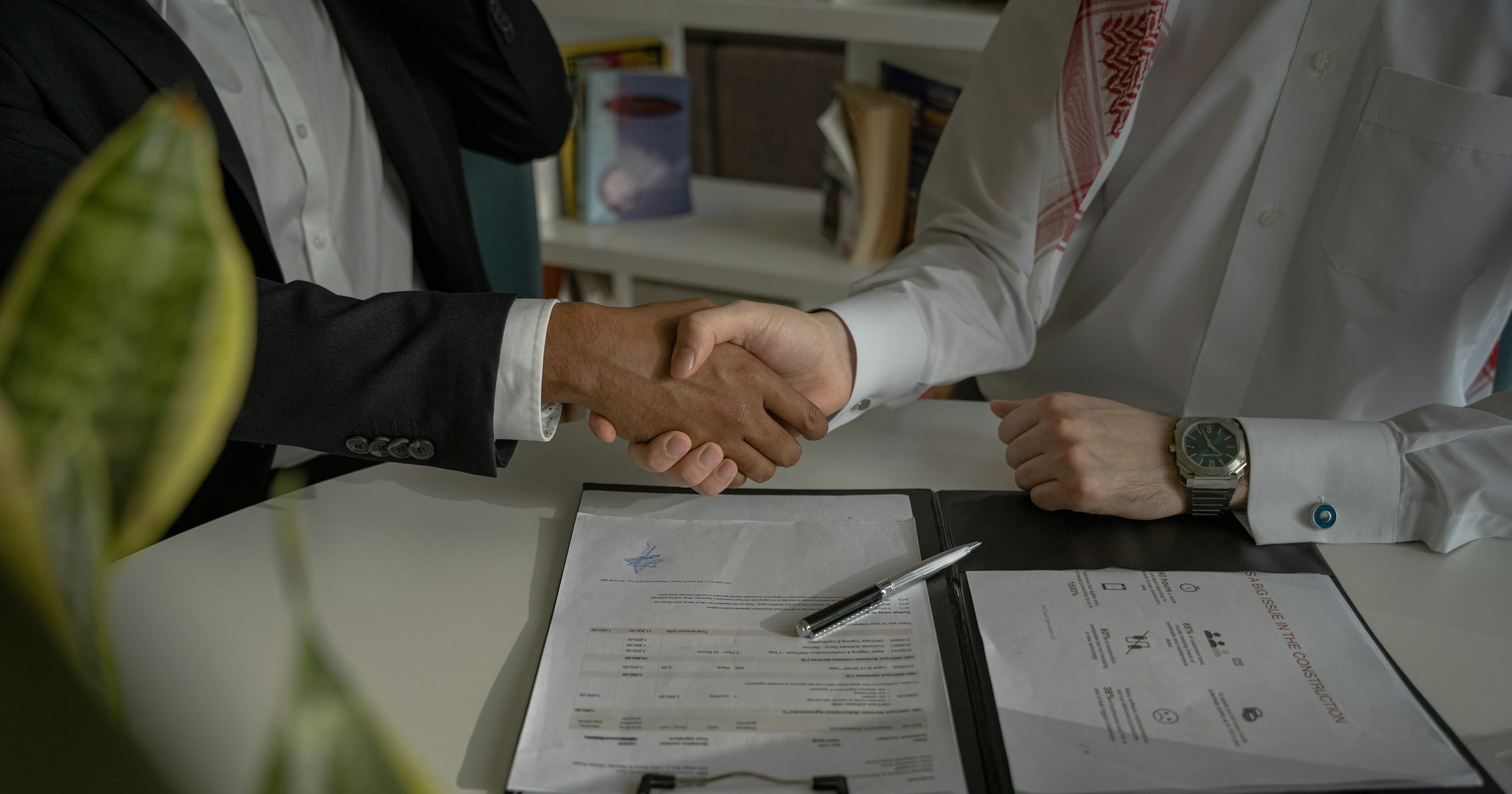 A game studio reviewing a contract with their video game lawyer